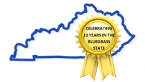A gold medal with ribbons on it

Description automatically generated